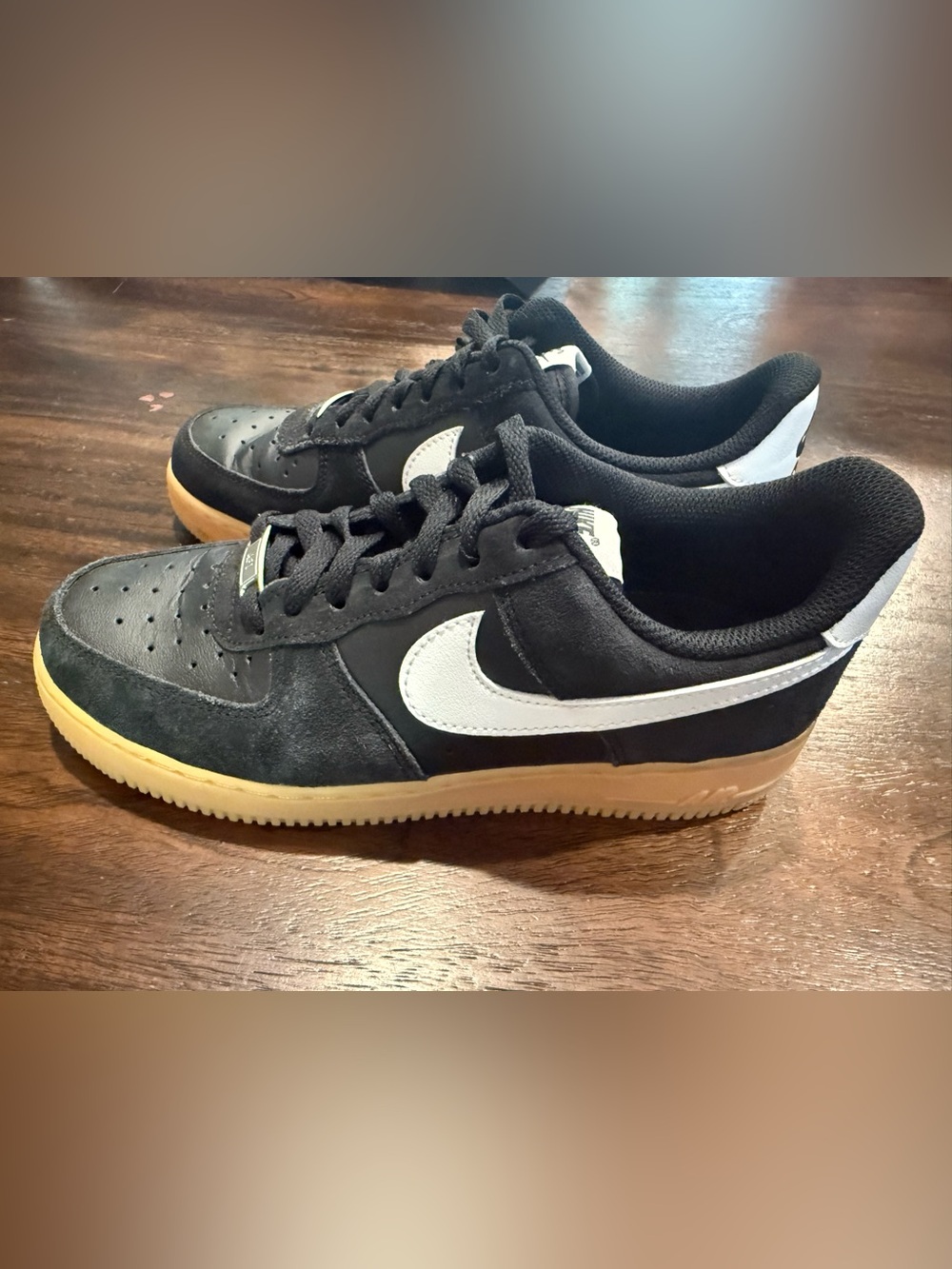 Nike Black Sneakers with White Swoosh and Gum Sole